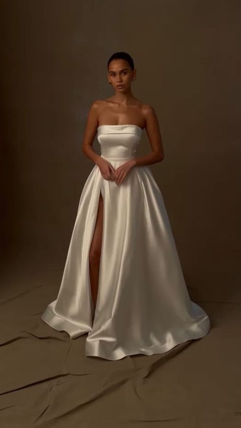 MESHKI | If you’re looking for your wedding dress, stop scrolling. The EILEEN gown. 🕊 | Instagram Outfits To Try On Wedding Dresses, Crisp White Wedding Dress, A Line Elegant Wedding Dress, Stunning Dresses Wedding, Satin Wedding Dress With Straps, Christian Siriano Wedding Dress, Meshki White Dress, Tight Silk Wedding Dress, Clean Girl Wedding Dress