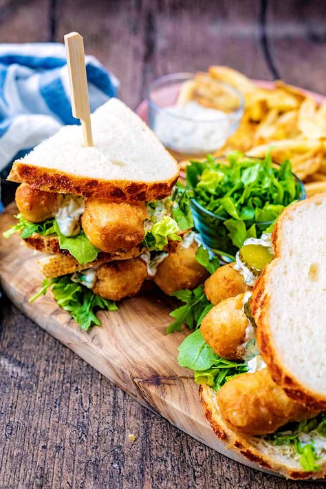 A Fish Finger Sandwich is such a childhood favourite and also a classic pub grub choice. We have taken a basic fish finger sandwich to the next level. Thick slices of bread topped with chunky fish fingers, crispy greens and our homemade tartare sauce. The perfect posh fish finger sandwich for grown-ups. Pub Grub Ideas, Fish Finger Sandwich, Recipe For Tartar Sauce, Homemade Fish Fingers, Finger Sandwich, Tiger Bread, Tartare Sauce, Pub Grub, Fish Fingers