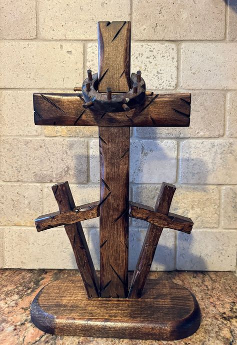 Handmade Three Crosses design. Details in wood made with grinder and blow torch. Crown made with hole saw and thorns made from cut wooden dowels. Fun Easy Wood Projects, Wooden Crosses Diy Rustic, Wood Crosses Ideas Rustic, Christmas Woodworking Projects That Sell, Small Wooden Projects Diy, Small Wood Crafts Diy, Cross Wood Projects, Wooden Christmas Projects, Wood Crosses Ideas