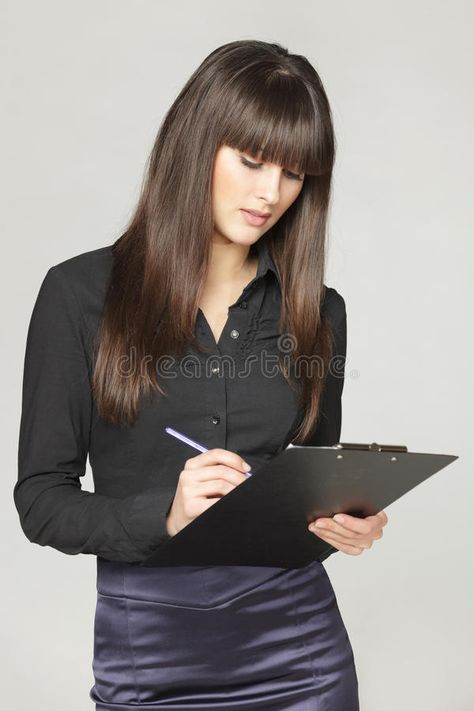 Female making notes. Young business woman making notes on a clipboard, isolated #Sponsored , #PAID, #paid, #making, #Young, #clipboard, #notes Person Holding Clipboard Reference, Clipboard Pose Reference, Holding Clipboard Reference, Clipboard Art, Making Notes, Bored Board, Pose References, Body Reference Poses, Character Inspo