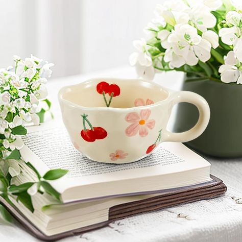 Cute mug with flower painted, lovely cherry: One of the features of this mug is a beautiful hand-painted watercolor design of flowers. Adding a touch of artistry and vibrancy, like a work of art.Small mug but so Adorable,will plays important roles in your life, to be your good partner at your office, home. Spoon Aesthetic, Aesthetic Mugs, Kawaii Coffee, Pink Mug, Cute Coffee Mug, Cup Handmade, Handmade Mug, Cute Coffee Mugs, Cute Coffee