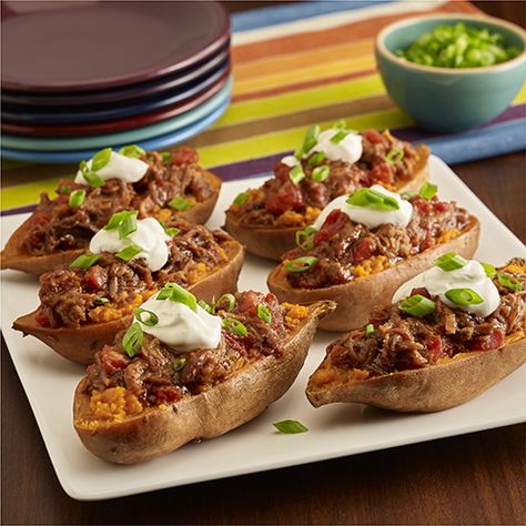 Stuffed sweet potatoes are 'filled' with prepared pulled pork in barbecue sauce with tomatoes, then topped with sour cream and green onions for a quick weeknight main dish Pork Stuffed Sweet Potatoes, Honey Chipotle Chicken, Ready Set Eat, Stuffed Sweet Potatoes, Paleo Crockpot, Food Coma, Bbq Pulled Pork, Weeknight Dinner Recipe, Pork Shoulder