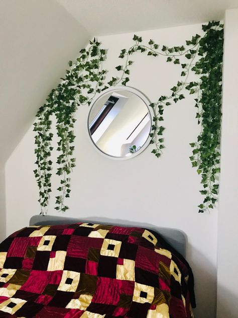 Fake ivy used to decorate bedroom wall. Fake Ivy Wall Bedroom, Ivy Wall Living Room, Fake Ivy Wall, Ivy On Wall Bedroom, Ivy Wall Decor, Ivy Wall Bedroom Aesthetic, Fake Ivy Decor Bedroom, Fake Ivy Decor Bedroom Ideas, Bedroom Wall Ivy