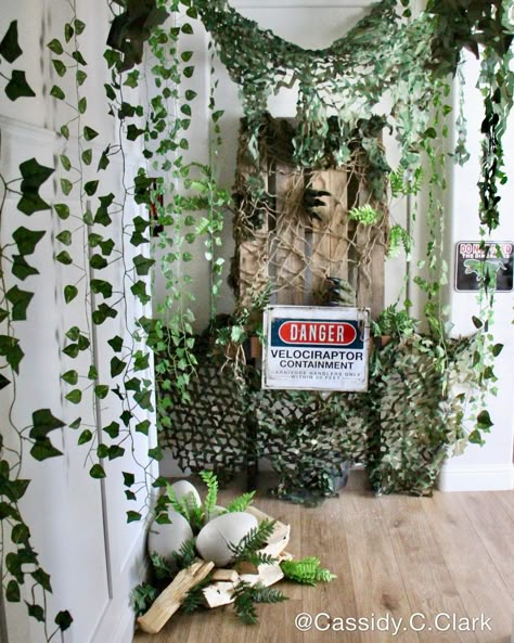 Luke’s Jurassic Birthday Party | CatchMyParty.com Jurassic Birthday Party Decorations, Dinosaurs Birthday Party Decorations, Jurassic Park Bday Party, Jurassic World Room Ideas, Jurassic Park Themed Birthday Party, Dino Theme Party Decor, Jurassic Park Door Decoration, Jurassic Theme Party, Elegant Dinosaur Party