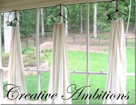 Tractor wheels and fabric--great on the patio or in the sun room. Unique Window Treatments, Simple Window Treatments, Window Treatments Ideas, Window Toppers, Faux Roman Shades, Diy Window Treatments, Unique Hardware, Unique Curtains, Curtain Hardware