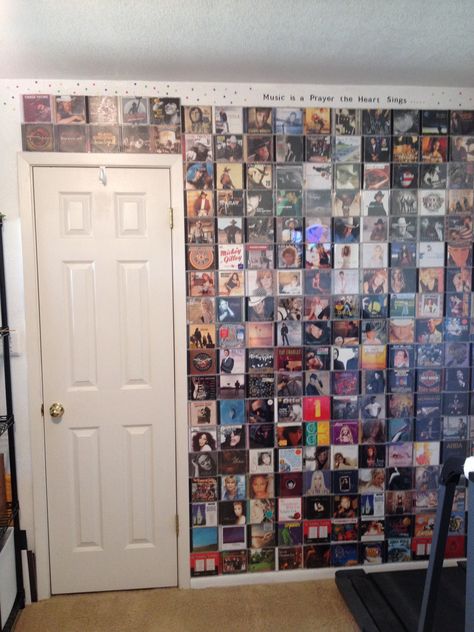 Great way to use all those empty cd cases! Cd Case Art, Cd Display Ideas, Dvd Wall, Cd Wall, Record Room, Cd Case, Cd Cases, Foo Fighters, Music Room