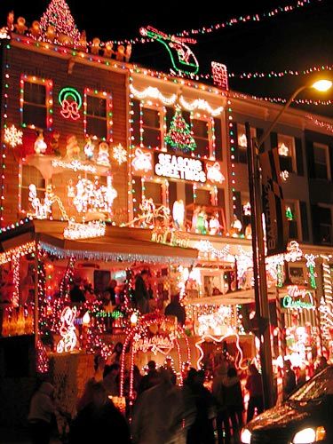 The Miracle on 34th Street, Hampden, Baltimore, Maryland : You stroll down Chestnut Avenue, and take a left on 34th Street, and suddenly evening turns to almost day. The houses are lit, and the street is bustling with people. Tacky treasures, as defined by Julie Mangin, are those that are not only tacky, but that possess an additional quality such as naivete, irony, or other qualities that test the boundaries or good and bad taste. Hampden Baltimore, Miracle On 34th Street, Christmas Mix, Baltimore City, Good And Bad, Bad Taste, December 2024, Baltimore Maryland, Christmas Season