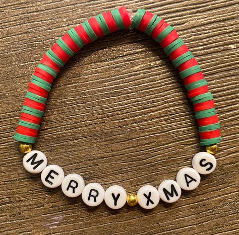 A Red and green beaded bracelet that says "Merry Xmas" Perfect Christmas gift!  Fits small wrists (teens, young adults, older kids) Xmas Bracelets Clay Beads, Holiday Bracelet Ideas, Christmas Clay Bead Bracelet Ideas, Green Bracelet Ideas, Xmas Bracelets, Handmade Jewelry Display, Holiday Bracelets, Bracelet Inspiration, Green Beaded Bracelets