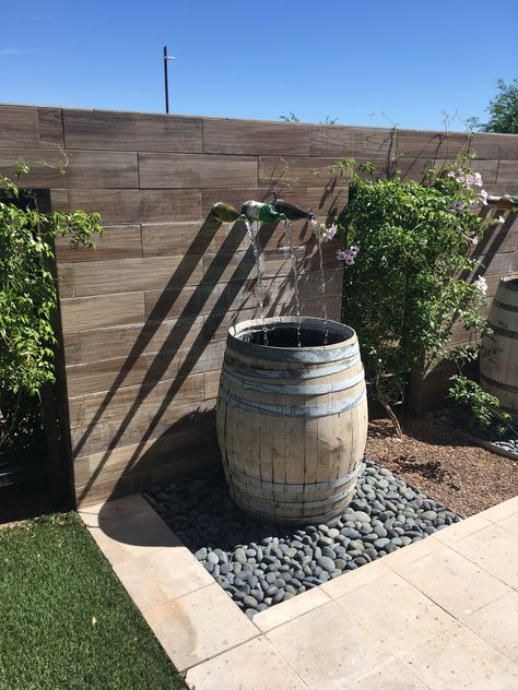 Winery Garden Ideas, Wine Barrel Fountain Diy, Wine Barrel Fountain, Wine Barrel In Garden, Wine Barrel Fence, Wine Barrel Backyard Ideas, Wine Barrel Planter Ideas, Wine Barrel Ideas, Wine Barrel Water Feature