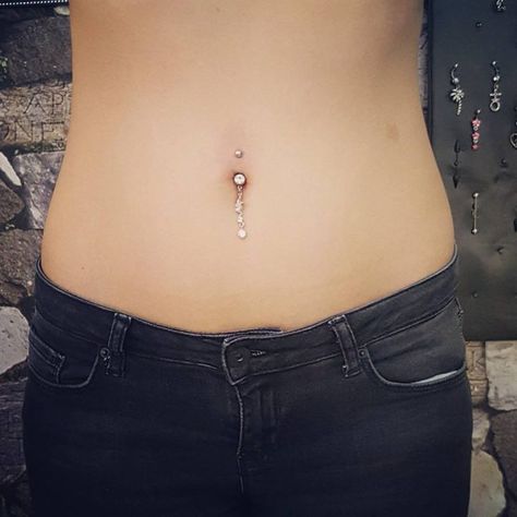 belly-button-piercing-6 Chest Dermal Piercing, Belly Button Piercing Ideas, Chest Dermal, Tattoo Journal, Belly Tattoo, Bellybutton Piercings, Tattoo Wedding Rings, Button Piercing, Alicia Silverstone