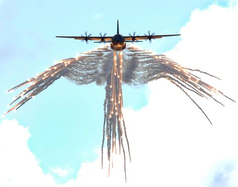 C-130 "angel wings" flare pattern   Saw this once when I was younger, AMAZING! C130 Hercules, Angel Flight, Ac 130, C 130, Military Jets, Jet Plane, Fighter Planes, Hercules, Military Aircraft