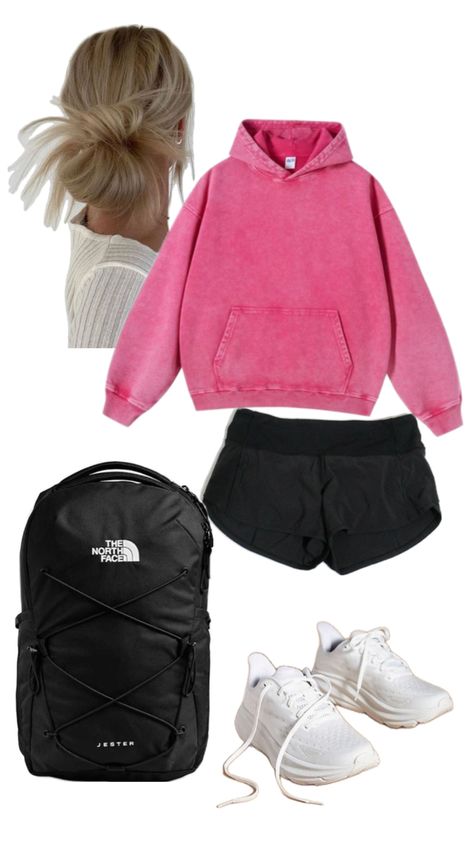 Casual study outfit featuring a pink hoodie, black Lululemon Speed Up Shorts, white Hoka tennis shoes, and a black North Face Jester backpack. The outfit is complemented by a messy low bun hairstyle. What To Wear With Black Lululemon Shorts, Cute Outfits With Lululemon Shorts, White Hoka Outfit, Pink Lululemon Shorts Outfit, Casual Study Outfit, Outfits With Lululemon Shorts, Hoka Tennis Shoes, Hoka Outfit, Lululemon Shorts Outfit