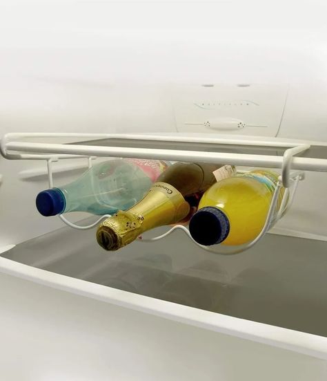 26 Clever Home Storage Solutions To Sort Even The Smallest Of Spaces | HuffPost UK Life Fridge Shelves, Wine Bottle Rack, Lid Organizer, Home Storage Solutions, Bottle Stand, Wine Display, Kitchen Waste, Bottle Rack, Wine Holder