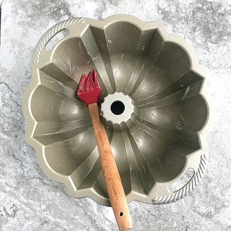 applying butter to a bundt pan with s red bristled pastry brush. first step on how to grease a bundt pan, Nordic Ware Bundt Pan, Bundt Cake Pans, Mini Bundt Cakes Recipes, Baking For Beginners, Pastry Brush, Mini Bundt, Bake Cakes, Store Bought Cake, Lemon Bundt Cake