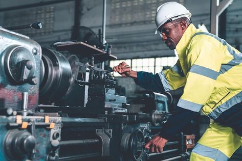 Factory worker or engineer do machine jo... | Premium Photo #Freepik #photo #lathe #industrial-machine #manufacturing-industry #industrial-equipment Article Summary, Factory Photography, Job Growth, Oil And Gas Industry, Factory Worker, White Industrial, Industrial Engineering, Industrial Machine, Industrial Photography