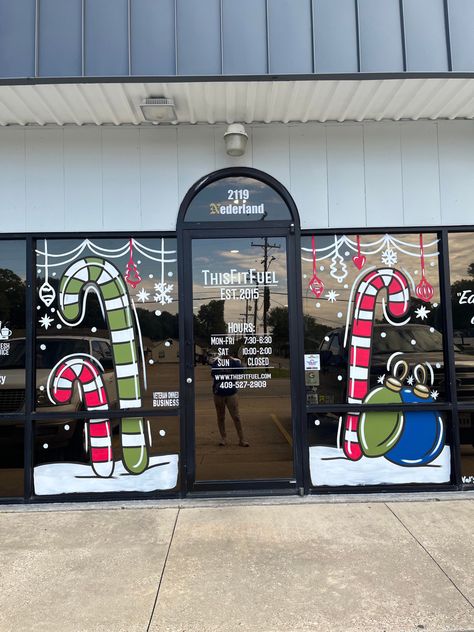 North Pole Window Painting, Store Front Christmas Window Painting, Hair Salon Christmas Window Painting, Christmas Window Display School, Salon Christmas Window Display, Christmas Store Window Painting, Painted Holiday Windows, Christmas Window Painting Colorful, Candy Cane Window Display