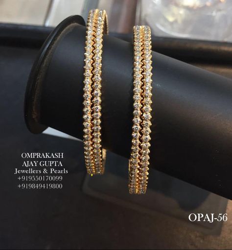 Elegantly Designed Diamond Closed Setting Bangles!! Perfectly inspires all the Desires in a Woman... Internationally Certified VVS-EF Diamonds used  (Omprakash AJAY GUPTA Jewellers, +919550170099) Close Setting Bangle Design, Close Setting Diamond Bangles, Omprakash Jewellers, Bangle Design, Diamond Bangles, Diamond Pendants Designs, Diamond Pendants, Stone Bangle, Bangles Jewelry Designs