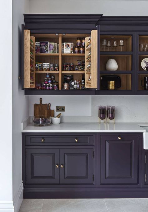 This stunning dark classic kitchen has been design with open shelving, door racks and deep drawers to contain a broad range of fresh and dried food items. Dark Purple Kitchen, Styling Open Shelves, Purple Kitchen Cabinets, Cozy College Dorm, Tom Howley Kitchens, Tom Howley, Classic Cabinet, Classic Kitchen Design, Shaker Design