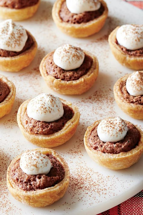 These mini Christmas desserts will make for beautiful presentation on your favorite cake plates and serving dishes. Plus, mini desserts make incredible homemade Christmas gifts for neighbors, friends, and family members. #minidesserts #singleserve #smalldesserts #christmas #easyminidessertideas #southernliving Mini Cranberry Cheesecake, Mini Christmas Desserts, Mini Thanksgiving Desserts, Hot Chocolate Brownies, Chess Pie Recipe, Small Desserts, Christmas Brunch, Christmas Food Desserts, Chocolate Pecan