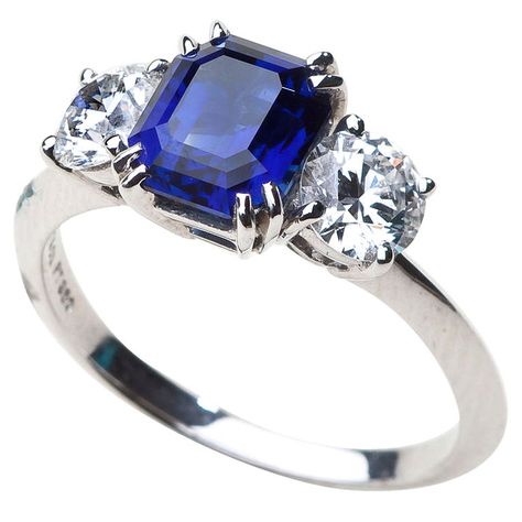 A classic diamond and sapphire ring by Tiffany  Co., approximately size 6 1/2. The platinum setting is impressed with a 1.25 carat faceted sapphire and two .80 carat full cut, VS diamonds of G-H color. Hallmarked Tiffany  Co. Diamond And Sapphire Engagement Ring, Tiffany Diamond Ring, Non Diamond Engagement Rings, Tiffany Wedding Rings, Sapphire Promise Rings, Diamond And Sapphire Ring, Tiffany Engagement Ring, Manicure Designs, Jewelry Tiffany