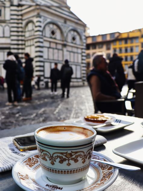 Enjoying a cup of coffee in a cozy café in Florence, showcasing a freshly brewed espresso or cappuccino with beautiful latte art, capturing the authentic Italian coffee culture and the charming ambiance of this historic city. Italian Coffee Shop, Italy Coffee, Planet Coaster, Rich Art, Coffee Pictures, Coffee Experience, Coffee Culture, Italian Coffee, Art And Culture