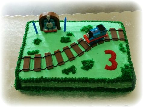 Thomas the train birthday cake, use Kit Kat bars cut in half for railroad tracks! Train Track Birthday Cake, Train Track Cake, Train Sheet Cake, Train Birthday Party Cake, Thomas Birthday Cakes, Thomas Cake, Thomas Party, Train Theme Birthday Party, Thomas Birthday Parties