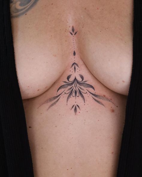 Dotwork and fineline ornamental sternum piece . . . . . #sternumtattoo #underboobtattoo #sternum #dotworkornament #dotworktattoos #subtletattoo #finelinetattoo #tattoosforwomen #aesthetictattoo #femininetattoo #bohotattoo #zwolletattoo #tattoozwolle Dragon Tattoo Sternum For Women, Angel Sternum Tattoo, Chandelier Sternum Tattoo, Sternum Tattoo Women Flowers, Celestial Sternum Tattoo, Sternum Ornament, Sternum Tattoo Big Bust, Female Sternum Tattoo, Dainty Sternum Tattoo Women