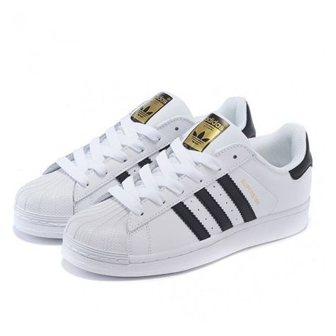 Adidas Originals Superstar Casual Shoes Gold standard White Black ($47) ❤ liked on Polyvore featuring shoes, sneakers, black and white shoes, black white sneakers, adidas originals sneakers, white and black sneakers and gold sneakers Adidas Superstar Black, Adidas Shoes Superstar, Striped Shoes, Striped Sneakers, Superstars Shoes, Black And White Shoes, Black And White Sneakers, Fashion Queen, Adidas Originals Superstar