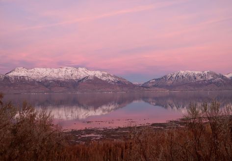 Utah Lake is a great place to view sunsets because water reflects the sky so beautifully and the mountains are so majestic in the background. Mountains With Lake, Lake Sunsets, Utah Lake, Utah Lakes, Lake Sunset, Great Places, The Mountain, The Sky, Utah