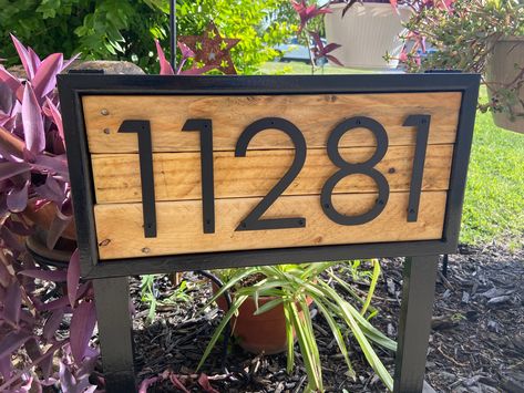 Update your house number sign with this hand crafted from reclaimed wood address stake with black, white, or stained frame and posts.   Beautify your garden or easily add some farmhouse curb appeal! Made from reclaimed wood and 5 inch metal numbers.  Enter house number at checkout! Please specify which background pattern you want: herringbone, vertical slats, or horizontal slats. Made to order! Black, white, or stained frame colors available. White or Stain Variety background colors available. P Diy House Number Sign For Yard, House Number Sign For Yard Driveways, Address Sign Ideas Driveway, Wooden House Number Sign, Farmhouse Curb Appeal, Farmhouse Address Sign, Wood Address Sign, Grooming Room, Craftsman Home Exterior