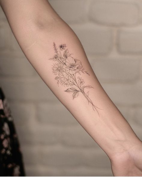 Forearm Tattoo Women Bouquet, Delicate Flower Tattoo Inner Arm, Accent Flower Tattoos, Small Floral Arm Tattoos For Women, Flower Inner Forearm Tattoo, Floral Bouquet Tattoo Forearm, Inner Forearm Tattoo Flowers, Wildflower Forearm Tattoo Women, Small Underarm Tattoo Women