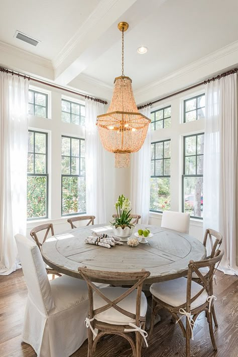 Cross back dining chairs in Beach House Dining Room Designed by Old Seagrove Homes Hamptons Dining Table, Beach House Dining Room, Dining Room Table And Chairs, Cottage Dining Rooms, Round Table And Chairs, Cross Back Dining Chairs, Round Dining Room, White Dining Room, Cafe Chairs