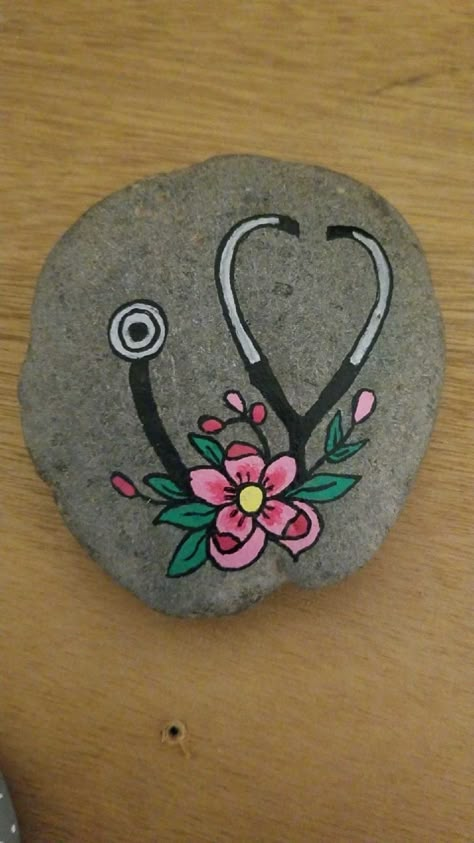 Medical Rock Painting Ideas, Nurses Painted Rocks, Nurse Paintings Ideas, Retirement Rock Painting Ideas, Painted Rocks For Nurses, Nurse Rock Painting Ideas, Rock Painting Art Acrylics, Diy Rocks, Rock Painting Flowers