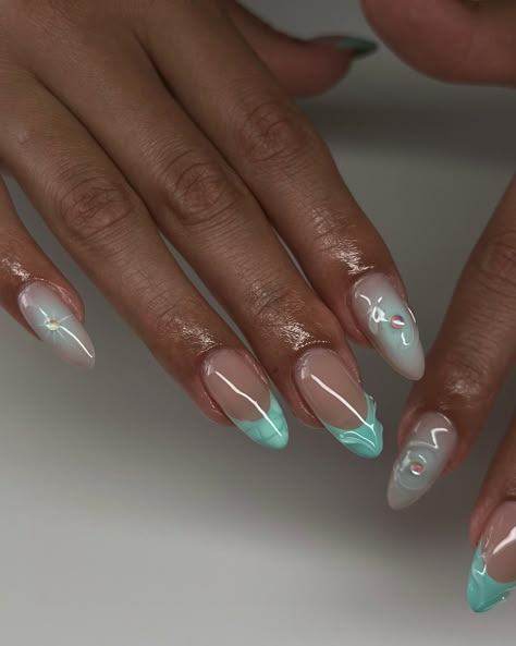 🩵🐬🧚🏽‍♂️🩴🦋 inspo: @ceesclaws @shopagaloreco products used: *bonding base *irish creme base *cyan + aquamarine *bling gel *diamond steel top coat use code ‘ALEXIA10’ at checkout 🤎 #nailsnailsnails #nailart #nailinspo #summernails #bluenails #3dnailart #3dnails #auranails #gelx #gelxnails #gelxinspo #gelxnailtech #cltnails #cltnailtech Aquamarine Nail Designs, Aquamarine Chrome Nails, Aqua Blue Nails, Aquamarine Almond Nails, Aquamarine Nails, Turquoise Aura Nails, Aquriam Nails, Sea Nails, Make Up Inspo