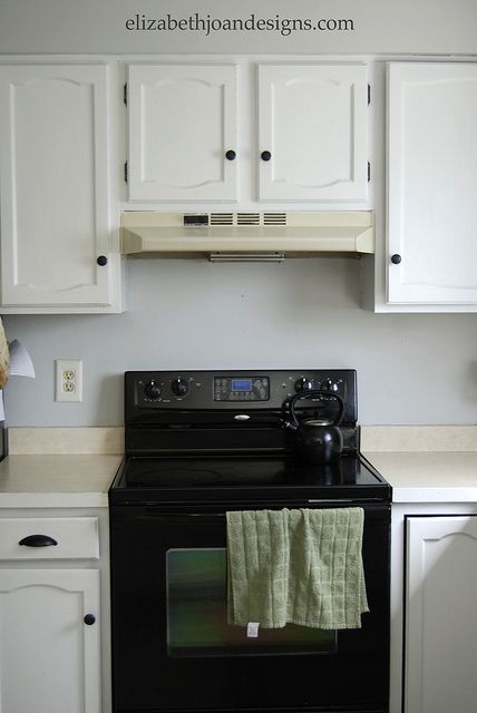 Range Hood MakeoverRange Hood Makeover - temporary solution until we install the new one Range Hood Makeover, Hoods Over Stoves, White Kitchen Hood, Painting Appliances, Painting Laminate Countertops, White Stove, Oven Range Hood, Stove Vent, Stove Black