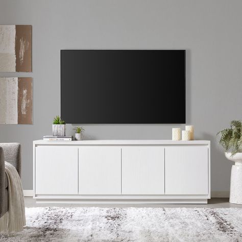 Latitude Run® Presque Rectangular TV Stand For TV's Up To 80" In White & Reviews - Wayfair Canada Grey White Tv Stand, 85 Inch Tv Stand Ikea, White Tv Stabd, Tv Console Modern Minimalist White, Minimalist Tv Stand White, White Tv Unit Uk, Ikea Bedroom Tv Stand, White Clad Tv Stand, Ikea Brimmed Tv Stand