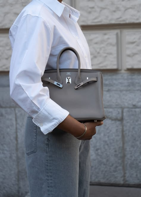 Hermes Birkin 25 Outfit, Hermes Birkin Outfit, White Shirt And Denim Jeans, Birkin Outfit, White Birkin, Chanel Mini Square, Luxe Handbags, Women Ceo, Gray Handbags