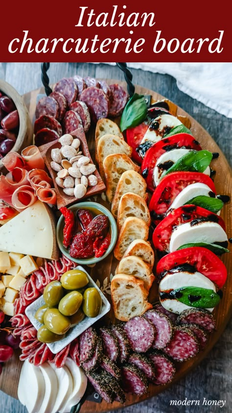 Italian Charcuterie Board. A beautiful Italian Charcuterie board filled with Italian meats and cheeses and paired with sauces, fruits, and vegetables. Perfect to pair with your Italian meal. Italian Appetizers Party, Italian Charcuterie Board, Italian Charcuterie, Antipasto Platter Italian, Charcuterie Board Party, Modern Honey, Charcuterie Board Meats, Charcuterie Appetizers, Christmas Charcuterie