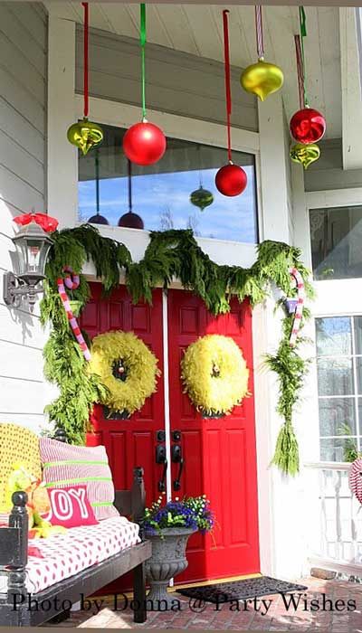 I'm pretty sure I don't want to get new/big ornaments for our front yard, but we have a lot of extras that are just small to tree-appropriate-levels-of-largeness glass balls that I could hang on ribbons like these and/or make garlands of to hang over the carport and across the big boring spot on our front wall. Grinch Christmas Decorations, Garland Decoration, Christmas Front Porch, Christmas Themes Decorations, 12 December, Christmas Porch, Grinch Christmas, Merry Little Christmas, Christmas Love