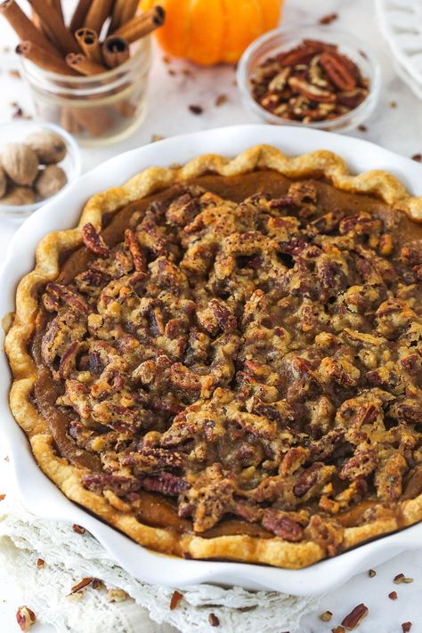 With a buttery, flaky crust, perfectly spiced pumpkin pie filling, and crunchy pecan praline topping, this Praline Pumpkin Pie takes basic pumpkin pie to a whole new level. Easy to make and perfect for the holidays! Pumpkin Praline Pie Recipe, Pumpkin Pie With Pecan Praline Topping, Pecan Praline Pumpkin Pie, Pumpkin Pie With Pecan Crust, Pumpkin Pie Pastry, Praline Pumpkin Pie Recipe, Pumpkin Praline Pie, Praline Pumpkin Pie, Pecan Praline Topping