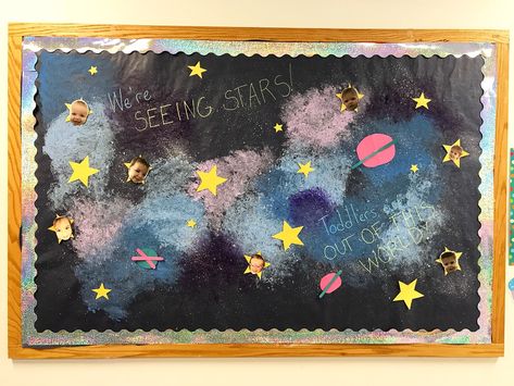 Our bulletin board for June! My inspiration was galaxy patterns. I used glow in the dark paint for some of the spatters so when we turn the lights off for nap, it glows! Solar Eclipse Bulletin Board, Galaxy Bulletin Board, Employee Appreciation Board, Preschool Classroom Themes, Space Theme Classroom, Glow In The Dark Paint, Infant Classroom, Dark Paint, Carson Dellosa