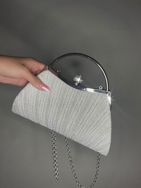 a hand holding a silver sparkly clutch with a metal short handle and long silver thin chain strap Silver Prom Purse, Prom Bags, Bright Dresses, White Clutch Purse, Sparkly Clutch, Sparkly Purse, Formal Bag, 20 Birthday, Prom Bag