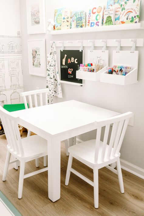 Our Basement Craft Table and Art Station - Danielle Moss Kids Playroom Art Station, Ikea Kids Table And Chair, Playroom Art Organization, Children Craft Table, Wall Art Station For Kids, Craft Table Playroom, Playroom With Table And Chairs, Kids Playroom Art Area, Kids Table Ikea