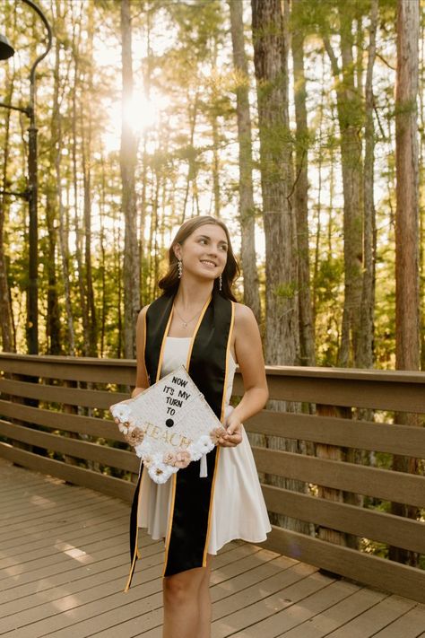 2022 Spring grad photos at UCF, University of Central Florida in Orlando, Florida Senior Picture Ideas Boardwalk, Outdoor Grad Photos, Ucf Grad Pics, Park Graduation Pictures, Mountain Graduation Photos, Ucf Grad Photos, Graduation Pictures Ucf, Forest Graduation Pictures, Graduation Pictures Nature