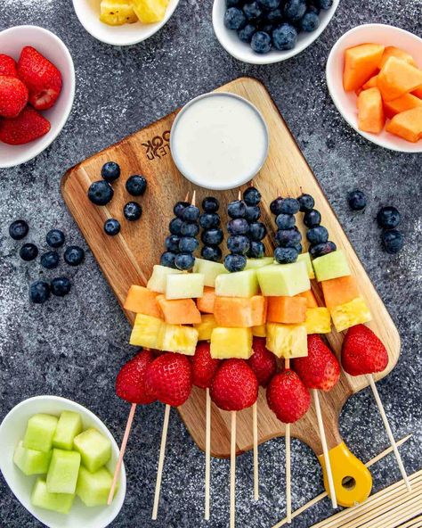 Dive into my Rainbow Fruit Skewers with Yogurt Dip - a colorful, fun, and healthy treat. Perfect for kids and adults alike! #rainbow #fruitskewers #yogurtdip #recipe Rainbow Fruit Skewers, Plain Pizza, Coconut Chia Seed Pudding, Caprese Skewers, Frozen Grapes, Fruit Skewers, Watermelon And Feta, Rainbow Fruit, Yogurt Dip