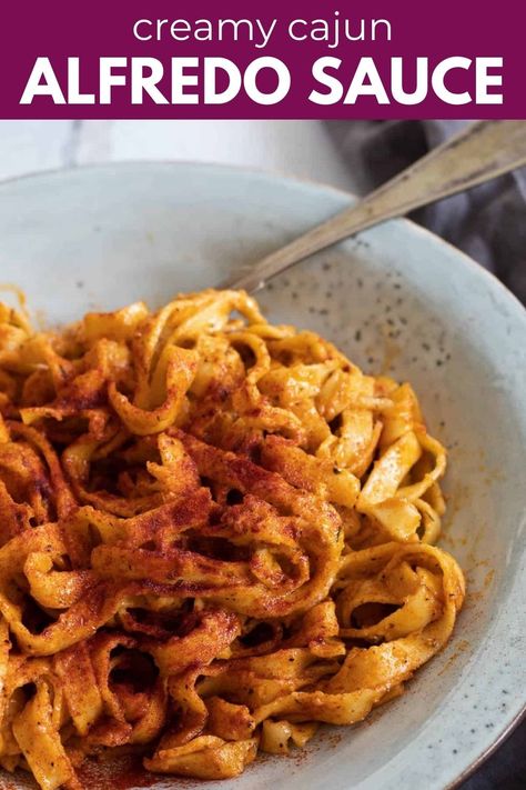 Indulge in the irresistible flavors of Cajun Alfredo pasta with our rich and creamy Cajun Alfredo sauce recipe. This dish is a perfect blend of spicy Cajun seasonings and velvety alfredo sauce, creating a decadent and flavorful meal that will satisfy all your cravings. Whether you're a fan of spicy dishes or simply love creamy pastas, this Cajun Alfredo pasta is sure to become a favorite in your recipe collection. Creamy Cajun Alfredo Sauce Recipe, Cajun Alfredo Sauce Recipe, Cajun Alfredo Pasta, Cajun Alfredo Sauce, Creamy Pastas, Vegetarian Pasta Recipes Easy, Cajun Seasonings, Cajun Alfredo, Pasta Bake Vegetarian