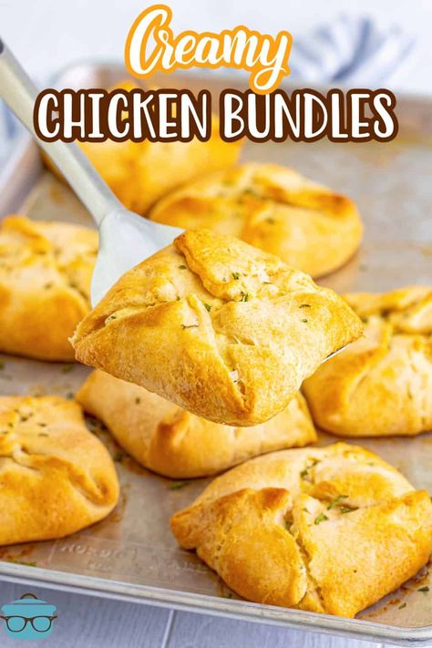 A serving spatula holding a Chicken Bundle above a platter of them. Mediterranean Slaw, Chicken Squares, Chicken Croissant, Chicken Bundles, Recipes Using Crescent Rolls, Chicken Pockets, Chicken Crescent Rolls, Chicken Crescent, Chicken Puffs