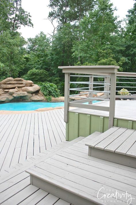 Deck color is Chatham Fog from Behr DeckOver paint. Chatham Fog Deck Stain, Stained Decks, Sherwin Williams Deck Paint, Behr Deck Over Colors, Behr Sandal Deck Stain, Behr Colors For Deck Staining Pressure Treated Wood, Balcony Decking, Painted Wood Deck, Behr Deck Stain Samples