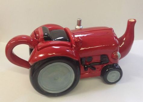 red tractor teapot, in shape of small red Farmall-type tractor, ceramic Whimsical Teapots, Tea Pots Art, Tea Pots And Cups, Novelty Teapots, Cute Teapot, Teapots Unique, Red Tractor, Tea Kettles, Unique Tea