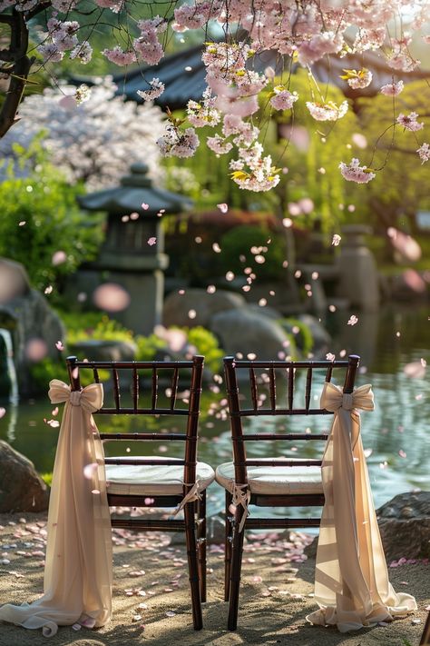 Immerse in the tranquility of a Zen garden with our spring wedding inspo 🌸. Discover how to incorporate serene cherry blossom designs into your wedding chair covers for an ethereal setting. Perfect for brides dreaming of a floral-themed day! #WeddingInspiration #SpringWedding #ZenGarden #CherryBlossoms #WeddingDecor #BridalStyle #FloralDesign #ElegantWedding Bride Theme, Japanese Garden Wedding, Zen Wedding, Enchanted Garden Wedding, Japanese Zen Garden, Afternoon Wedding, Chair Covers Wedding, Japanese Wedding, Cherry Blossom Wedding